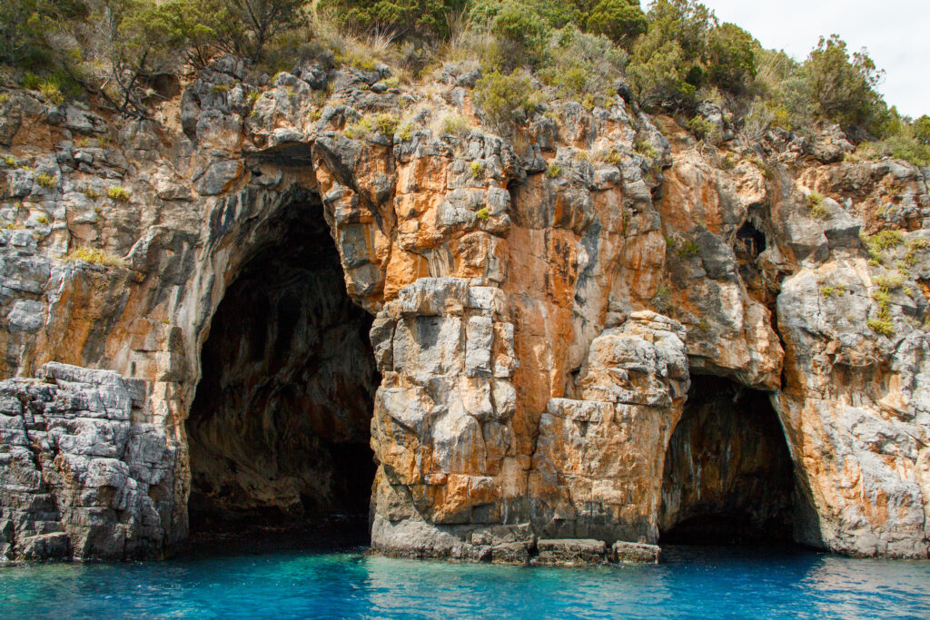Pozzallo caves near Camerota from the sea, Campania, Italy